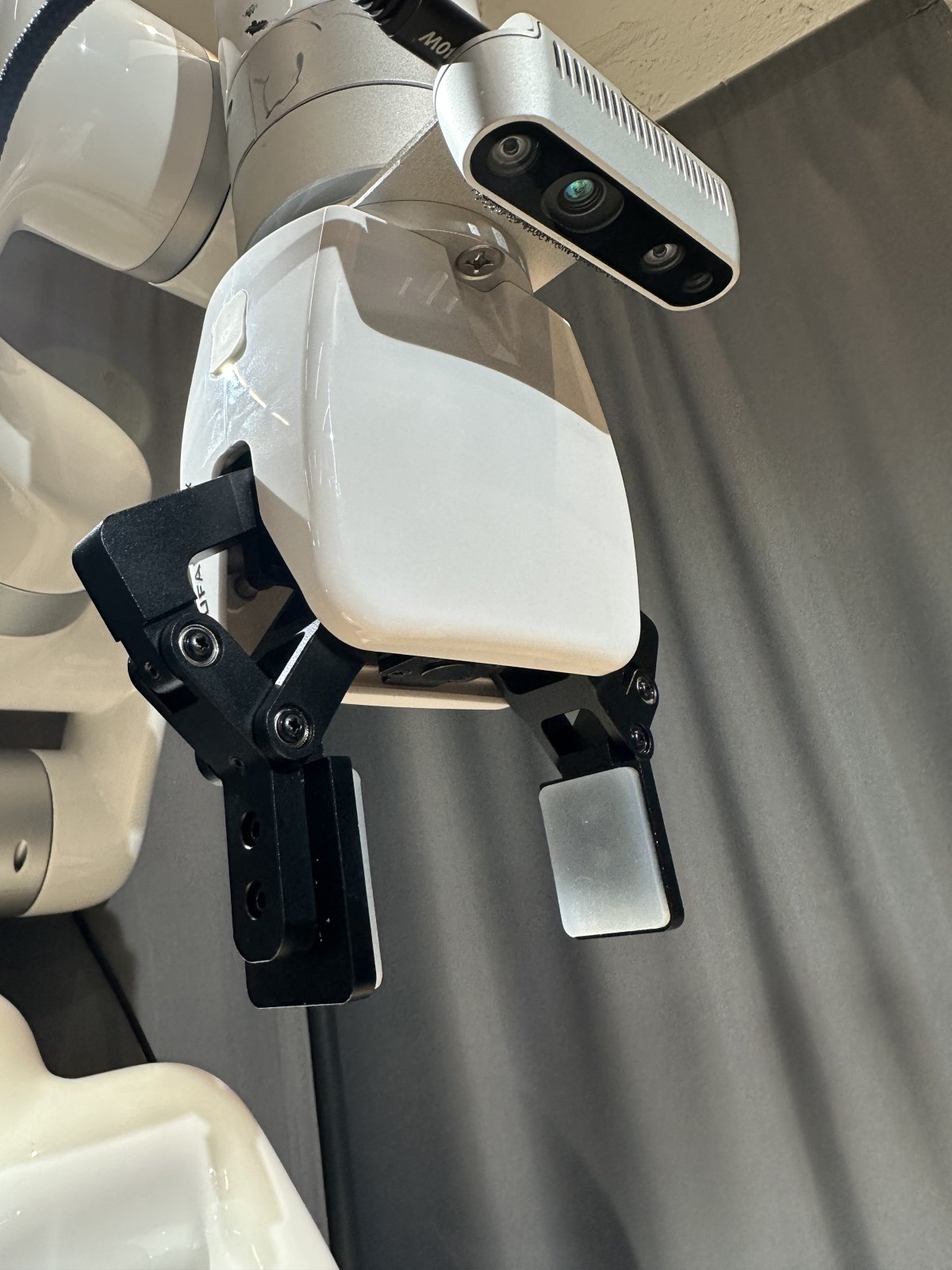 The G2 gripper with the wrist camera mounted above it